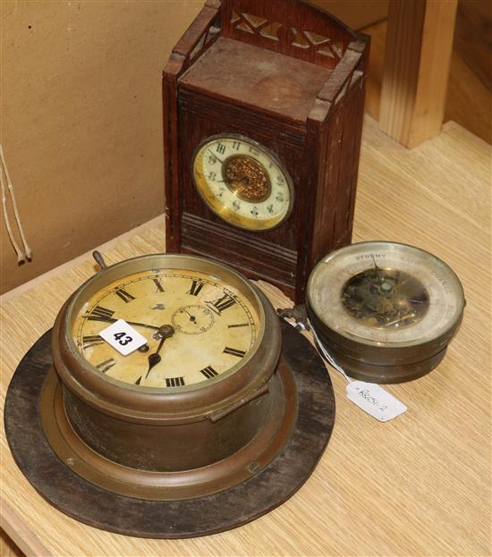 A French mantel clock, barometer and ships bulkhead